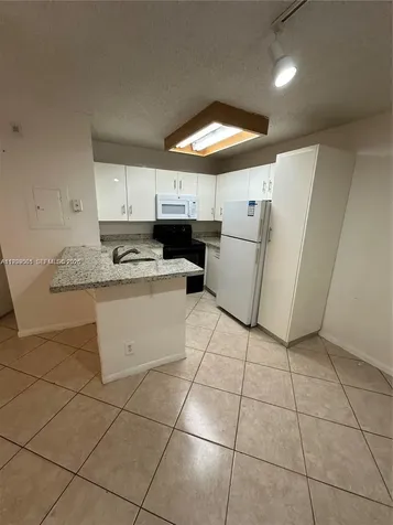 951 Lyons Road Coconut Creek FL 33063
