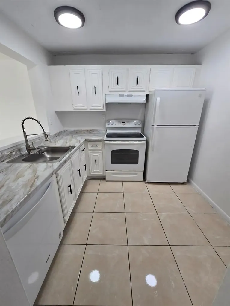 486 NW 165th Street Road Miami FL 33169