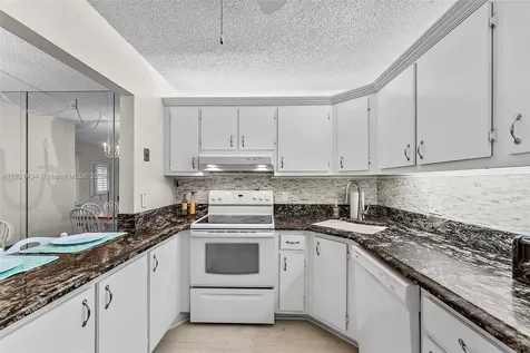 341 Pine Ridge Circle Green Acres FL 33463