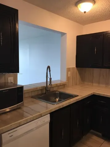 496 NW 165th Street Road Miami FL 33169