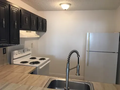496 NW 165th Street Road Miami FL 33169
