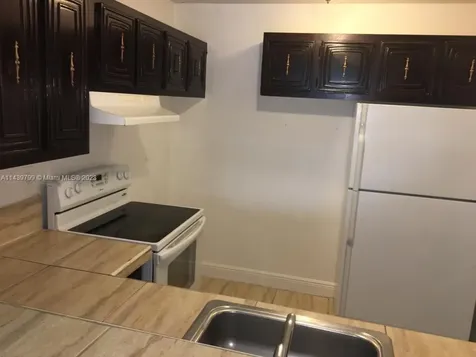 498 NW 165th Street Road Miami FL 33169