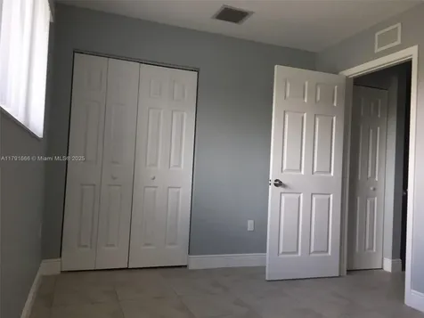 1990 NW 4th Court Miami FL 33136