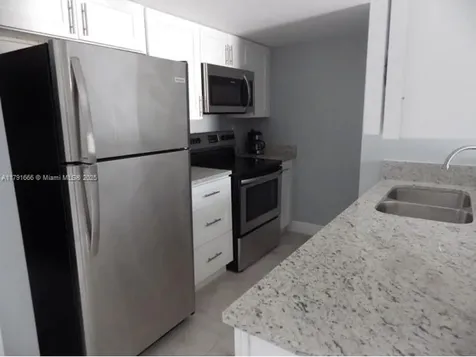 1990 NW 4th Court Miami FL 33136