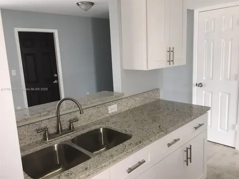 1990 NW 4th Court Miami FL 33136