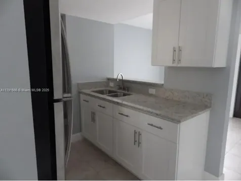1990 NW 4th Court Miami FL 33136