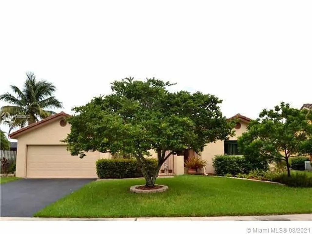 516 NW 104th Terrace Plantation FL 33324