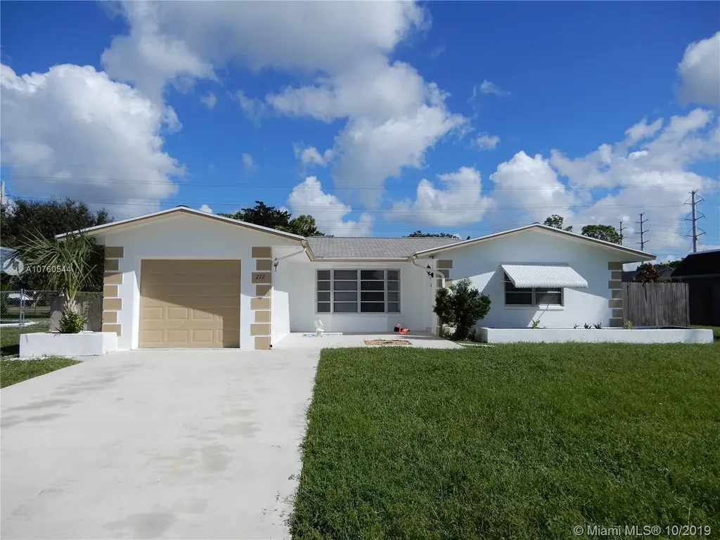 212 Sandpiper Avenue Royal Palm Beach FL 33411
