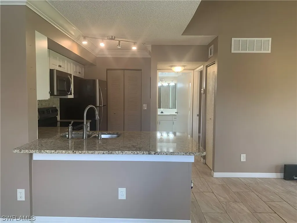1240 Wildwood Lakes Boulevard Naples FL 34104