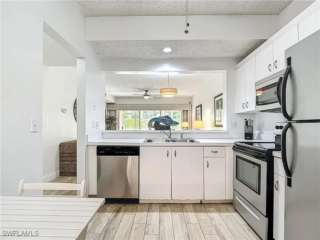 1044 Woodshire Lane Naples FL 34105