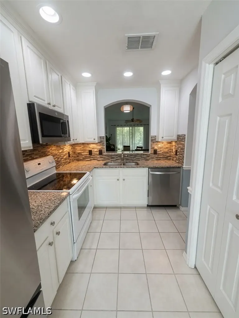 7715 Woodbrook Circle Naples FL 34104