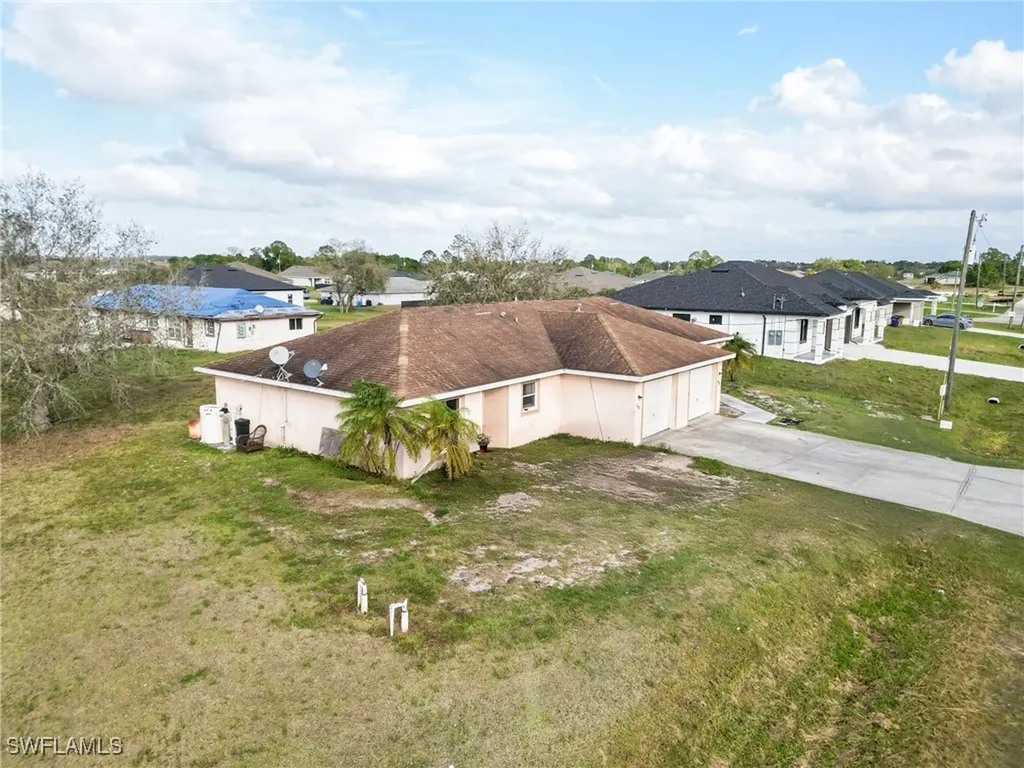 2408/2410 Crawford Avenue N Lehigh Acres FL 33971