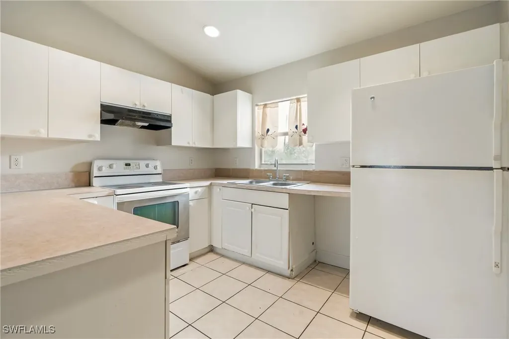 2408/2410 Crawford Avenue N Lehigh Acres FL 33971