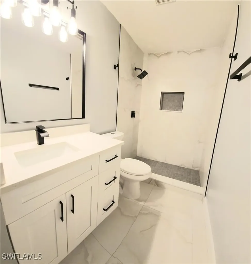7745 Woodbrook Circle Naples FL 34104