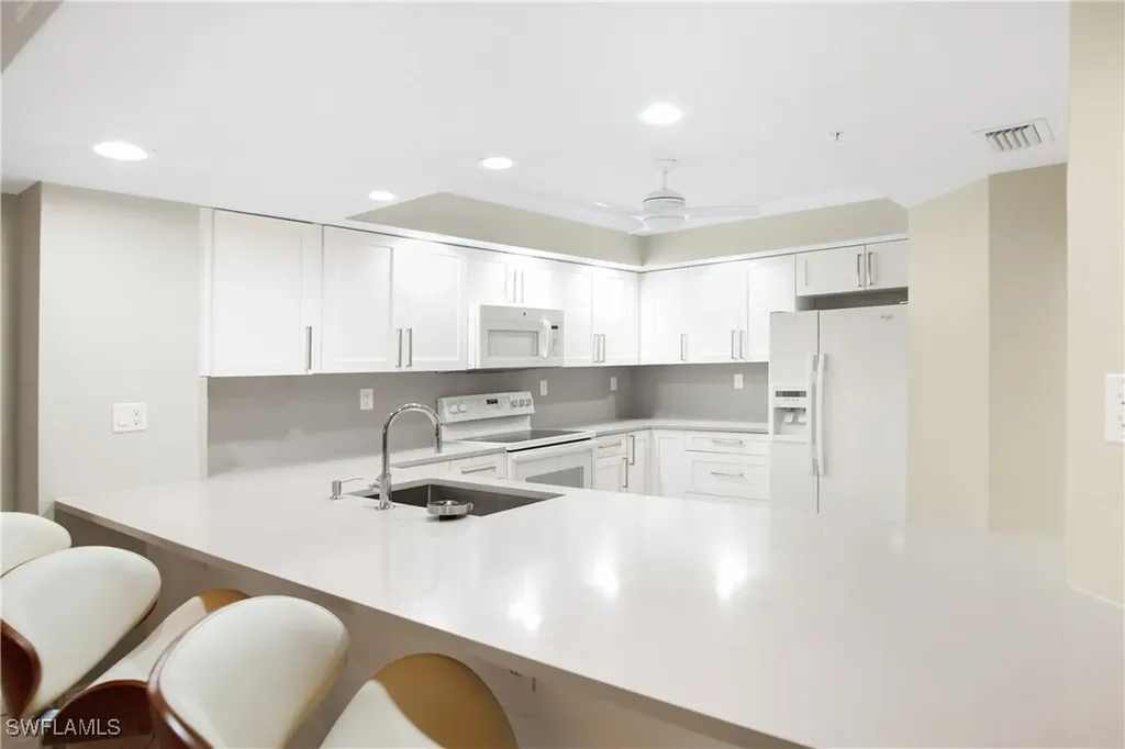 21 Bluebill Avenue Naples FL 34108