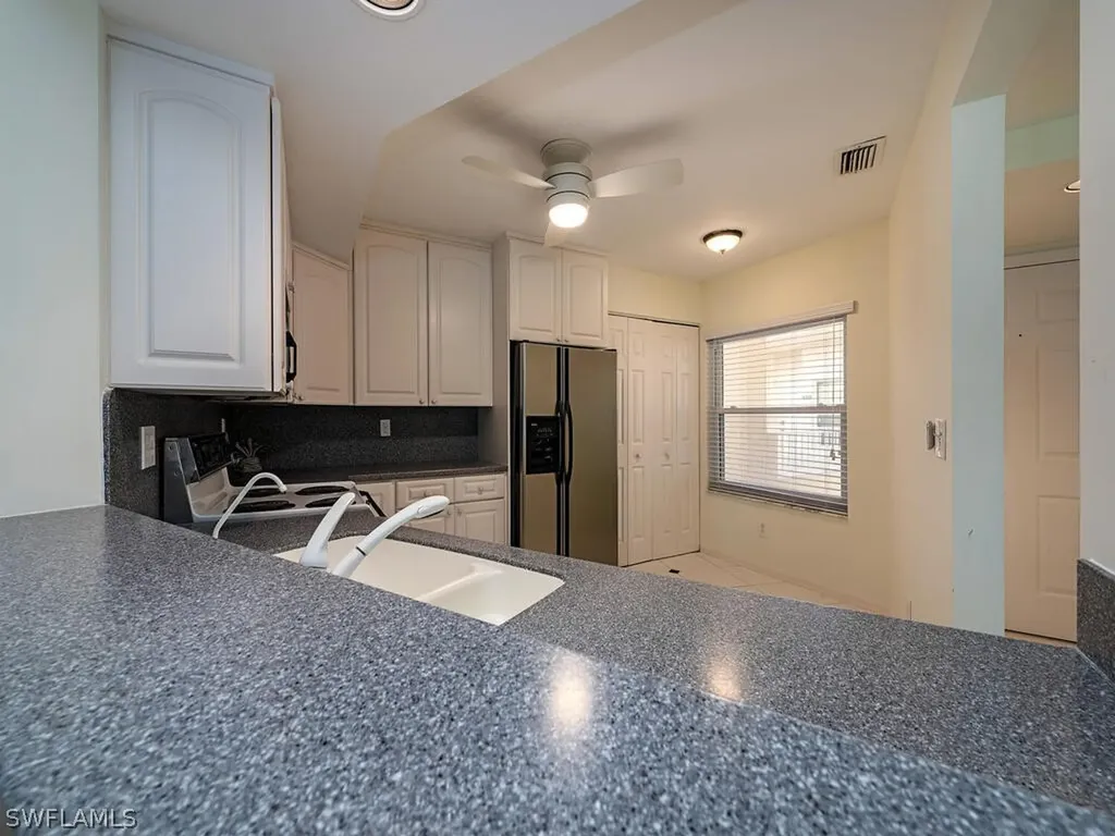 1044 Woodshire Lane Naples FL 34105