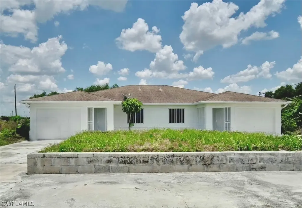 1591 / 1589 Gilbert Avenue S Lehigh Acres FL 33973