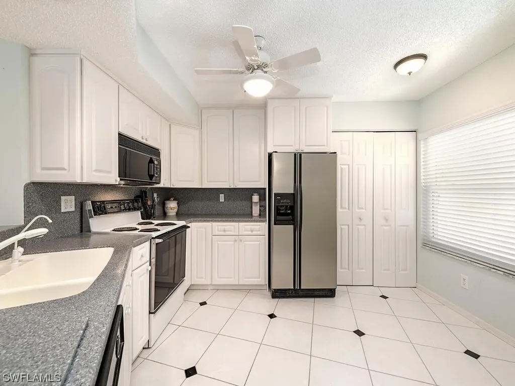 1044 Woodshire Lane Naples FL 34105