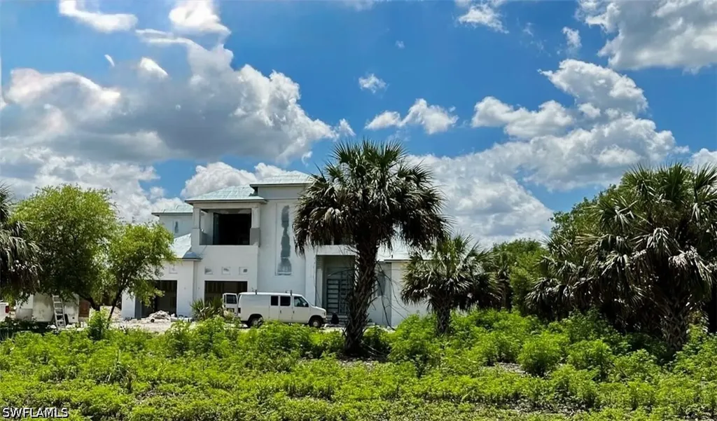 702 Shady Hollow Boulevard W Naples FL 34120