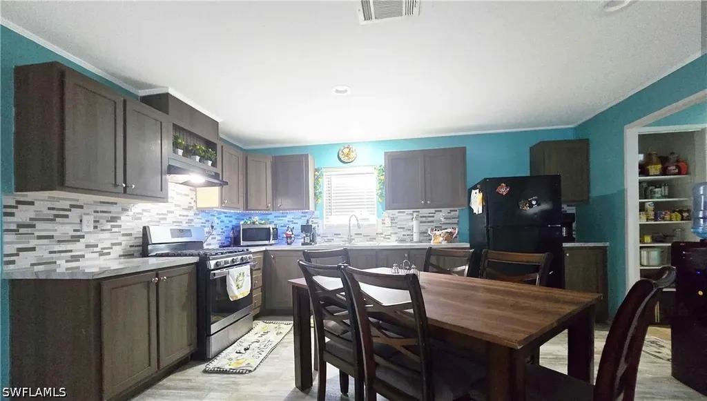 612 Hunting Club Avenue Montura Ranches FL 33440