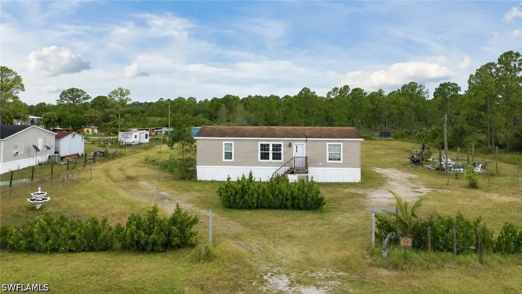 612 Hunting Club Avenue Montura Ranches FL 33440