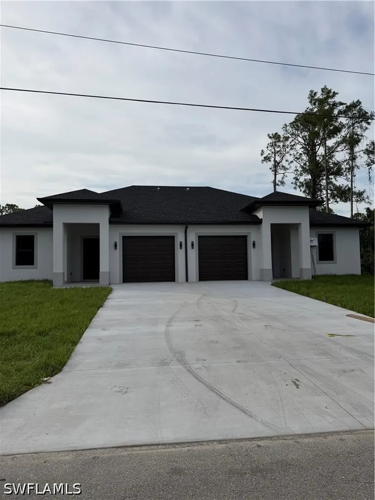 2909/2911 Owen Avenue S Lehigh Acres FL 33973