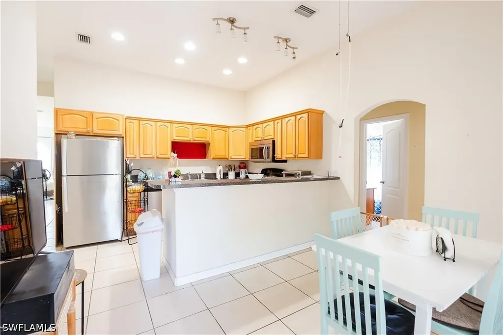 166 Pine Cone Avenue Montura Ranches FL 33440