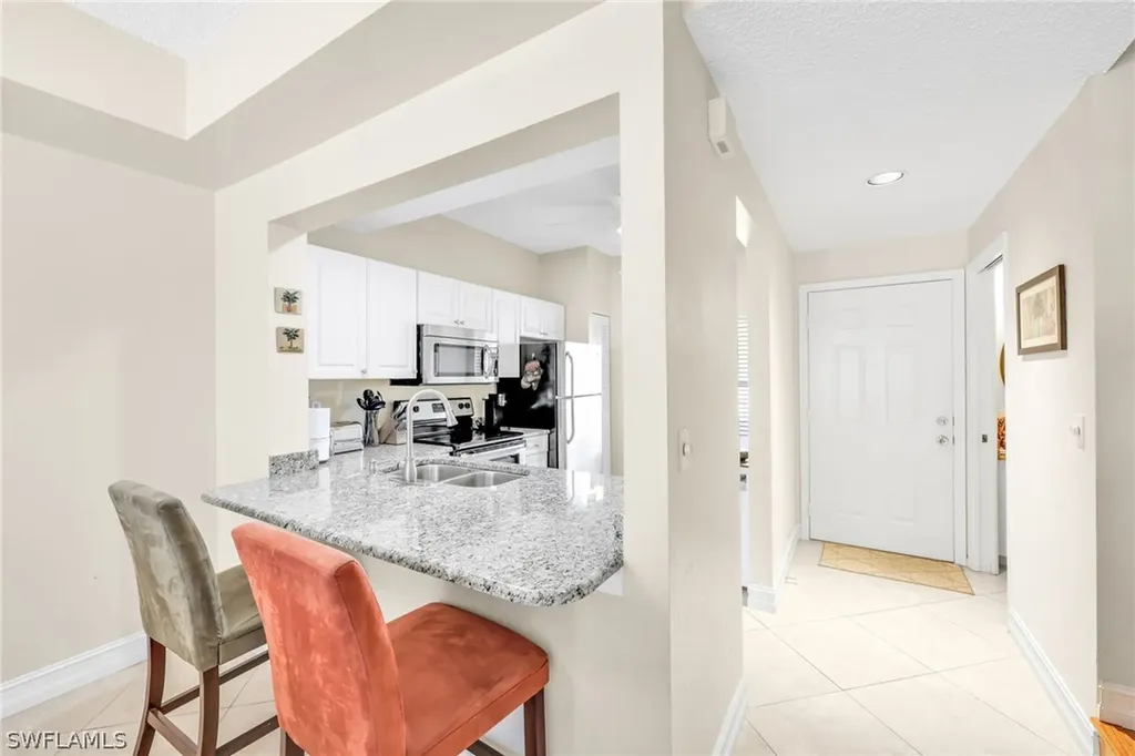 1044 Woodshire Lane Naples FL 34105