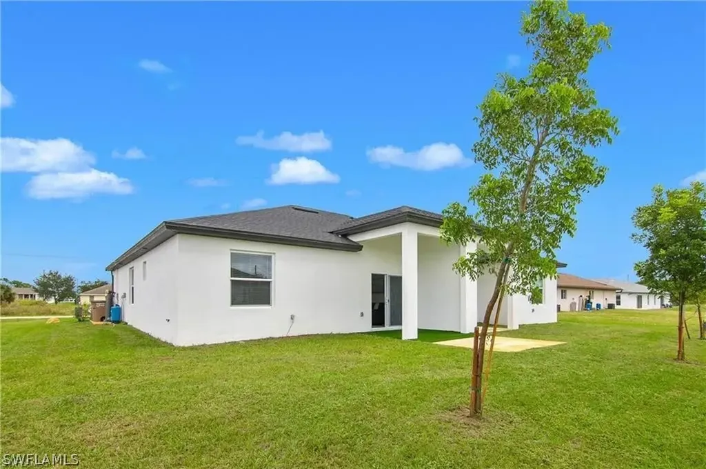 313/315 Ivan Avenue S Lehigh Acres FL 33973