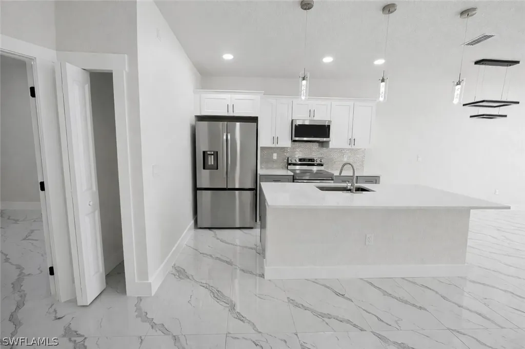 2423/2421 Milton Avenue S Lehigh Acres FL 33973
