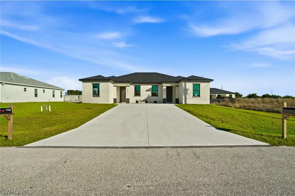 2404/2406 Mae Avenue S Lehigh Acres FL 33973