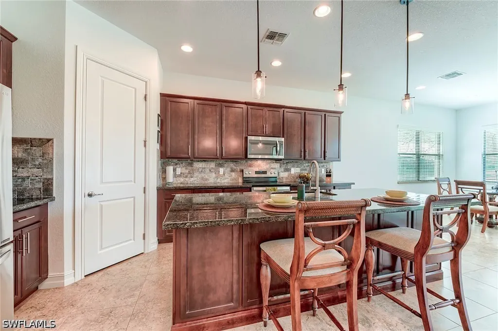 9209 Woodhurst Drive Naples FL 34120