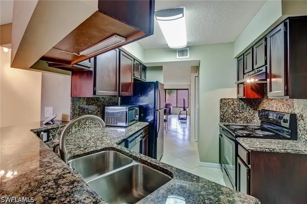 124 Cypress Way E Naples FL 34110
