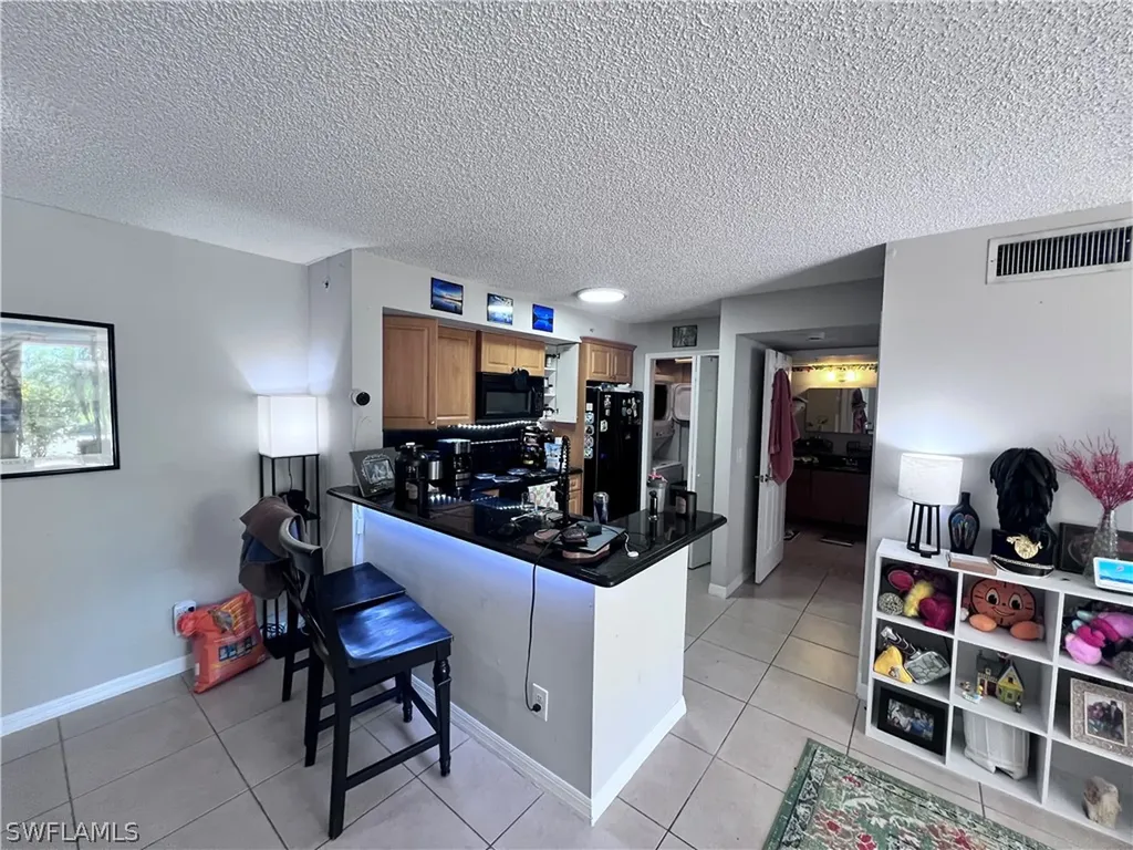 1240 Wildwood Lakes Boulevard N Naples FL 34104