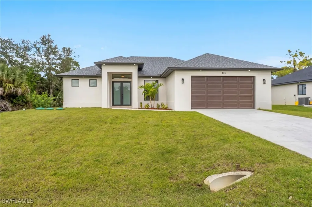 715 Theodore Vail Street E Lehigh Acres FL 33974