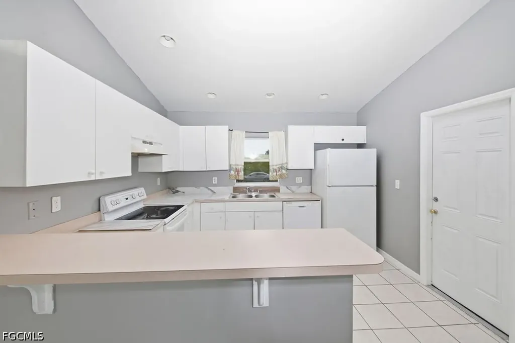 205/207 Homer Avenue S Lehigh Acres FL 33973