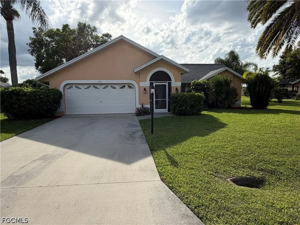 546 Whispering Wind Bend Lehigh Acres FL 33974