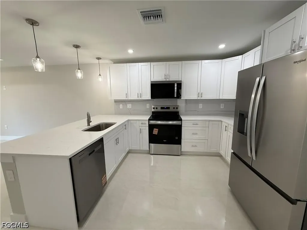405-407 Chalet Avenue S Lehigh Acres FL 33974