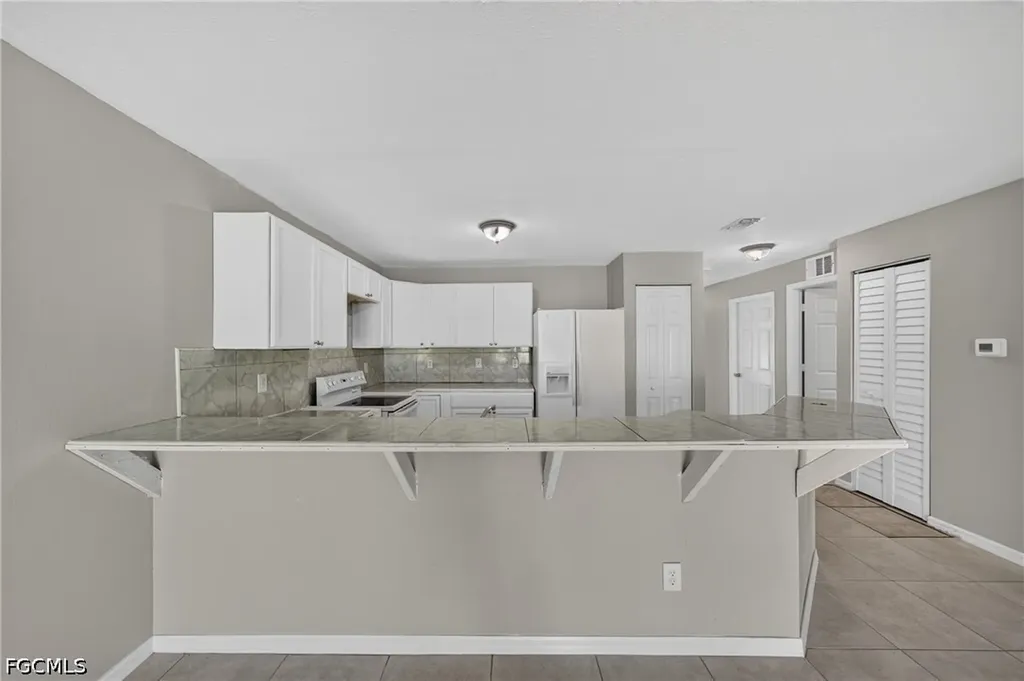772/774 Holmes Avenue Lehigh Acres FL 33974