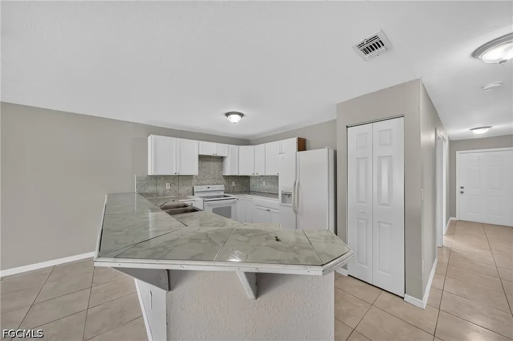 772/774 Holmes Avenue Lehigh Acres FL 33974