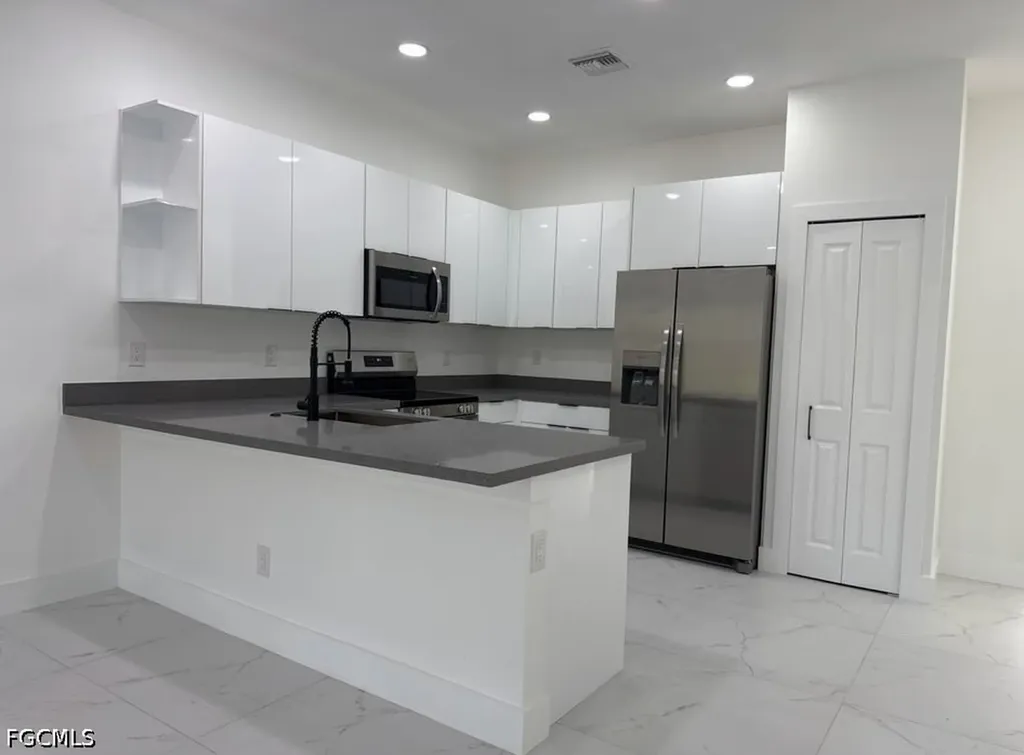 404-406 Chalet Avenue S Lehigh Acres FL 33974
