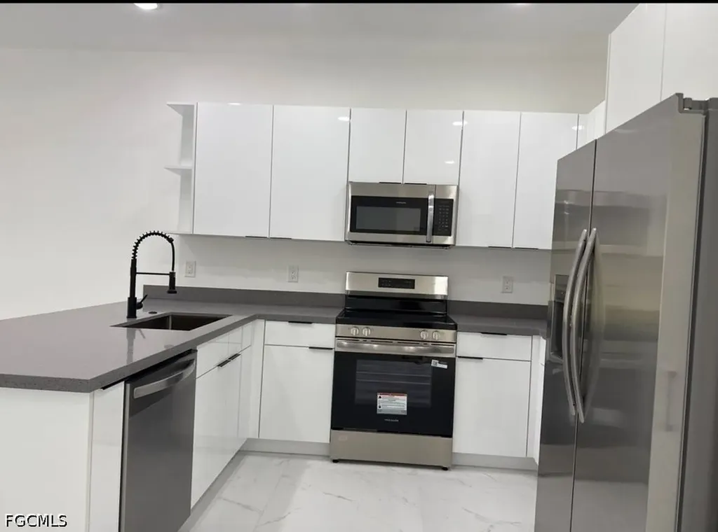 404-406 Chalet Avenue S Lehigh Acres FL 33974