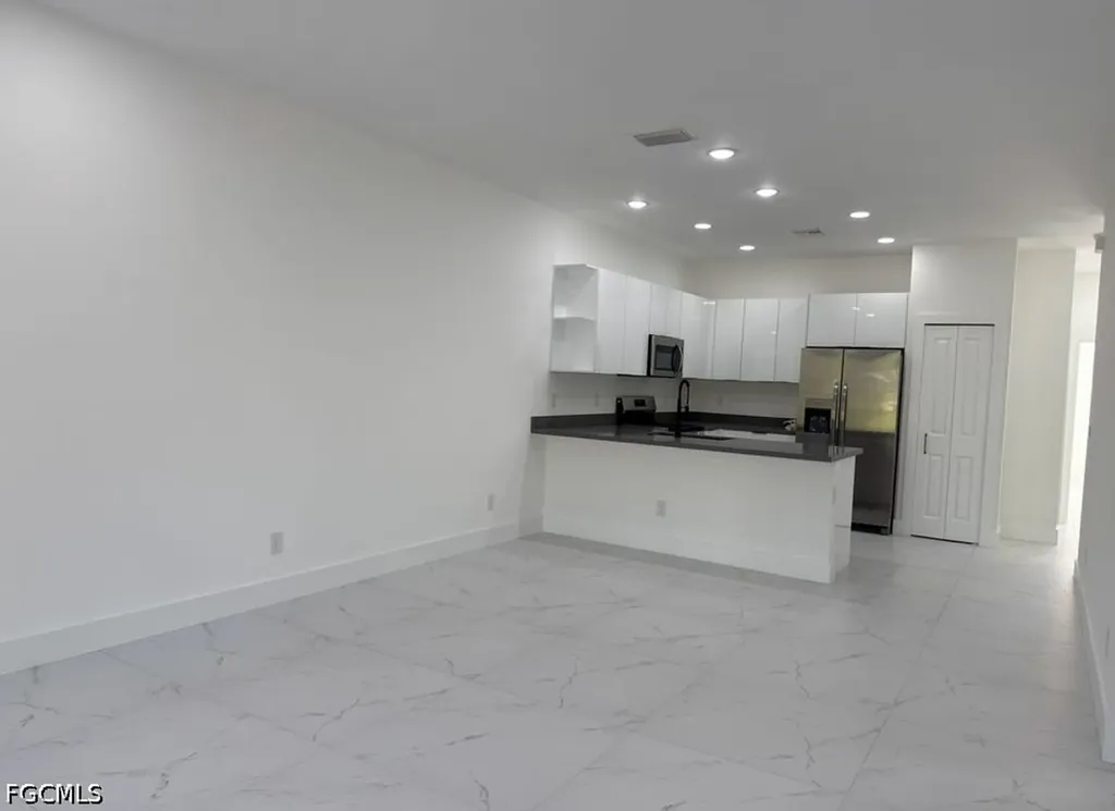 404-406 Chalet Avenue S Lehigh Acres FL 33974