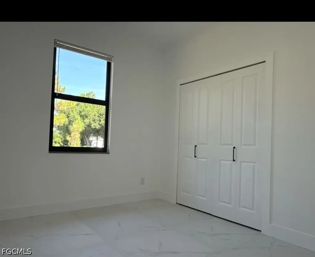 404-406 Chalet Avenue S Lehigh Acres FL 33974