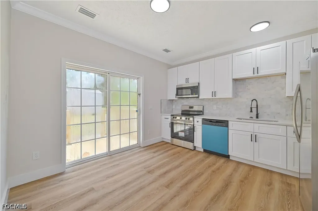 1076/1078 Ainsworth Street E Lehigh Acres FL 33974