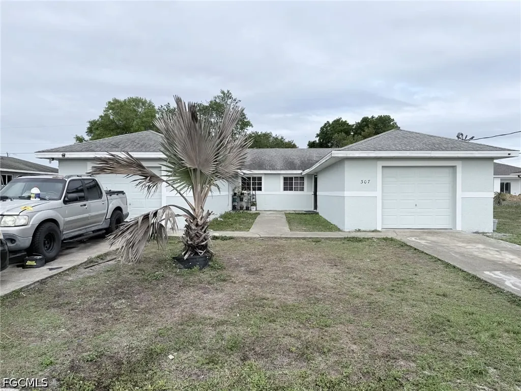 305-307 Harry Avenue S Lehigh Acres FL 33973