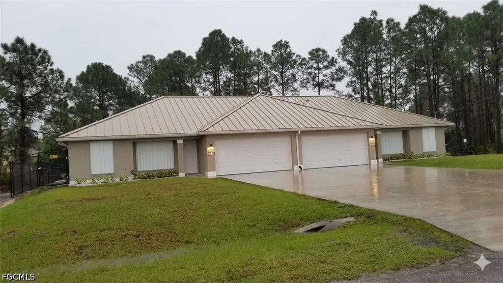 385/387 Carrillon Avenue S Lehigh Acres FL 33974