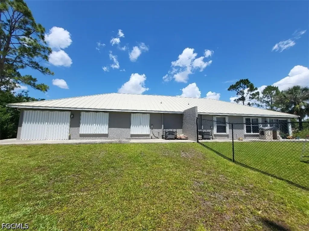 385/387 Carrillon Avenue S Lehigh Acres FL 33974