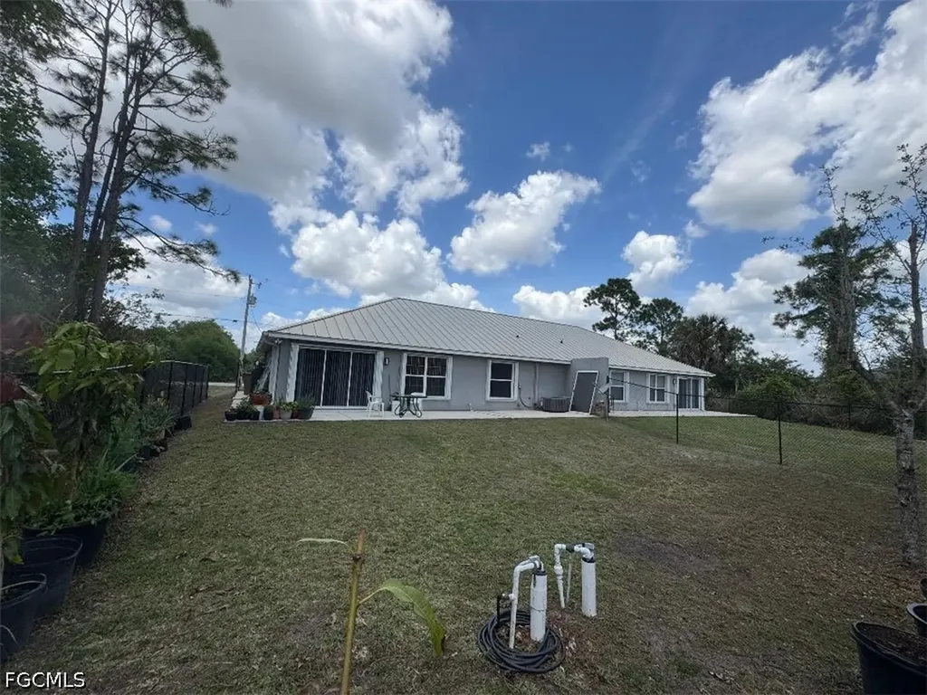385/387 Carrillon Avenue S Lehigh Acres FL 33974
