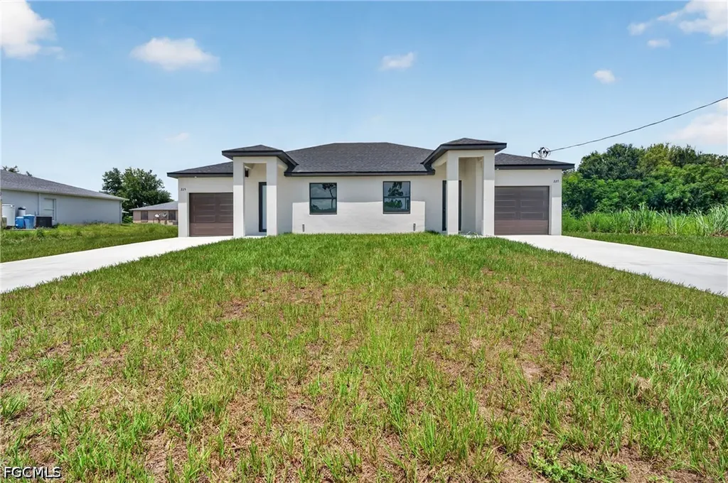 225/227 Ivan Avenue S Lehigh Acres FL 33973